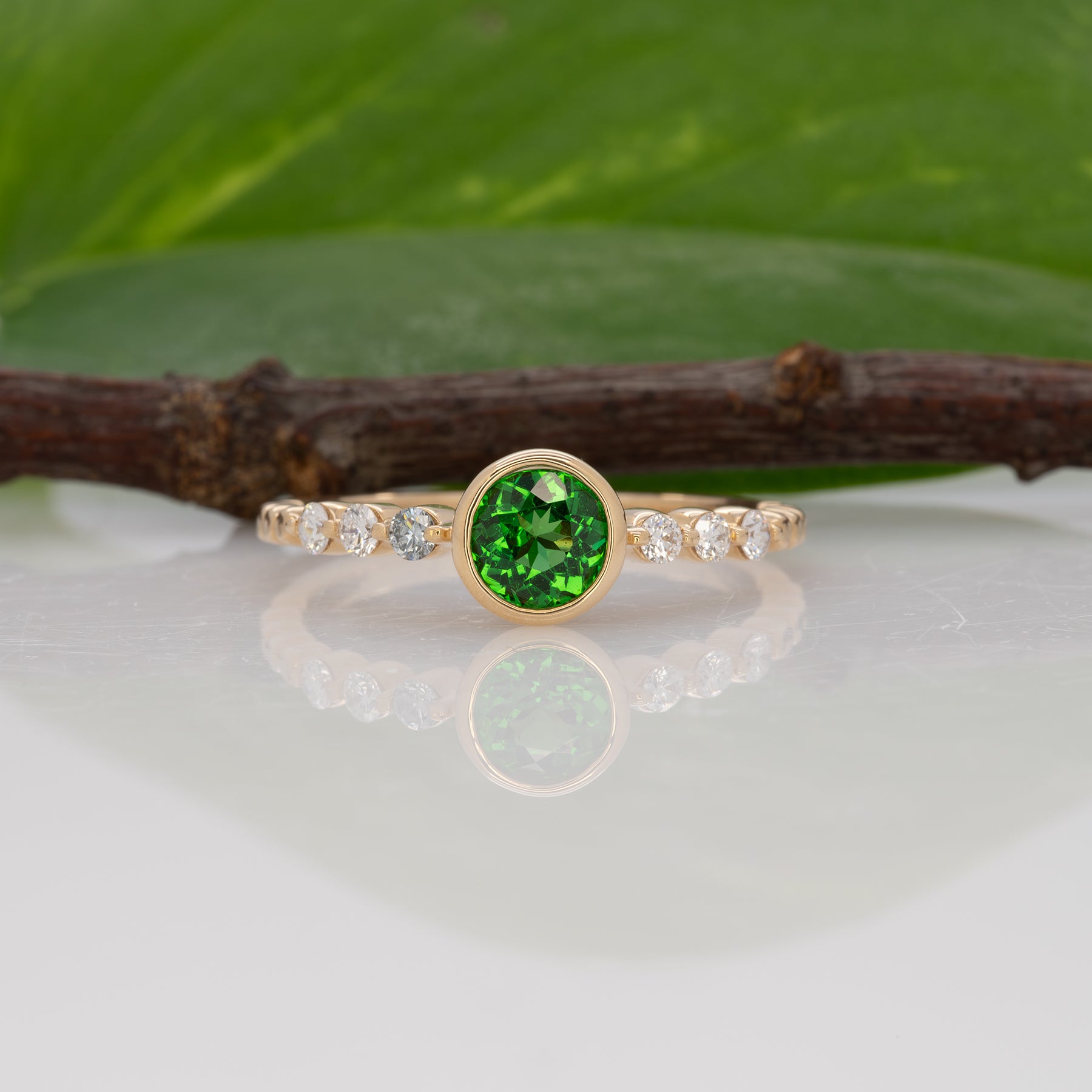 14K yellow gold tsavorite garnet round ring with diamond accents
