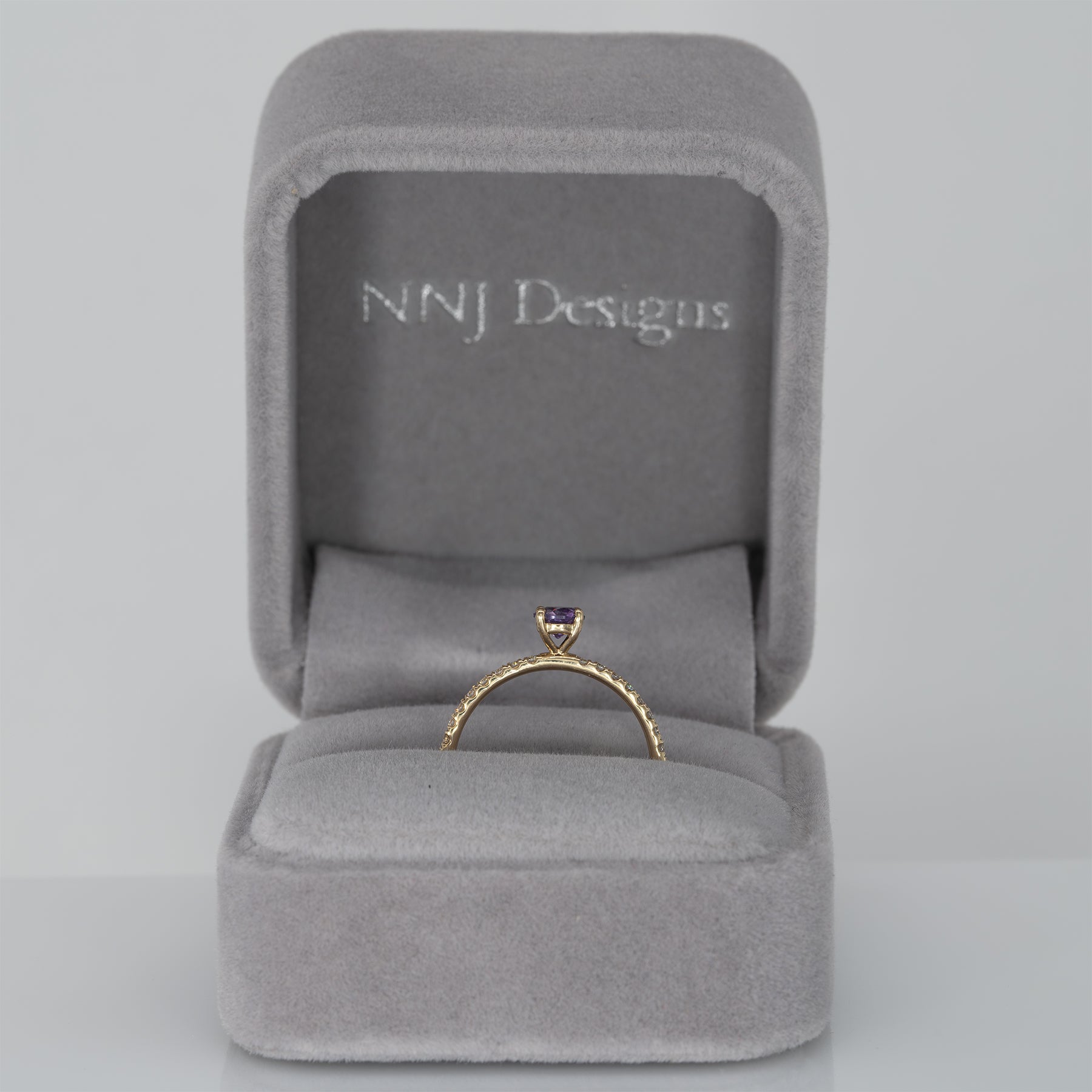 14K yellow gold purple sapphire round ring with diamond halo