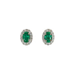 14K white gold emerald oval stud earrings with diamond halo