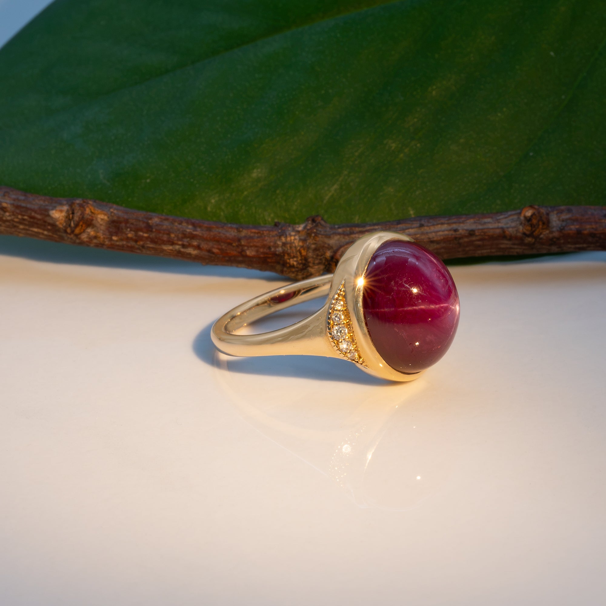 14K yellow gold star ruby cabochon ring with diamond accents