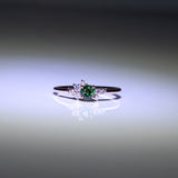 14K rose gold alexandrite ring with diamond accents