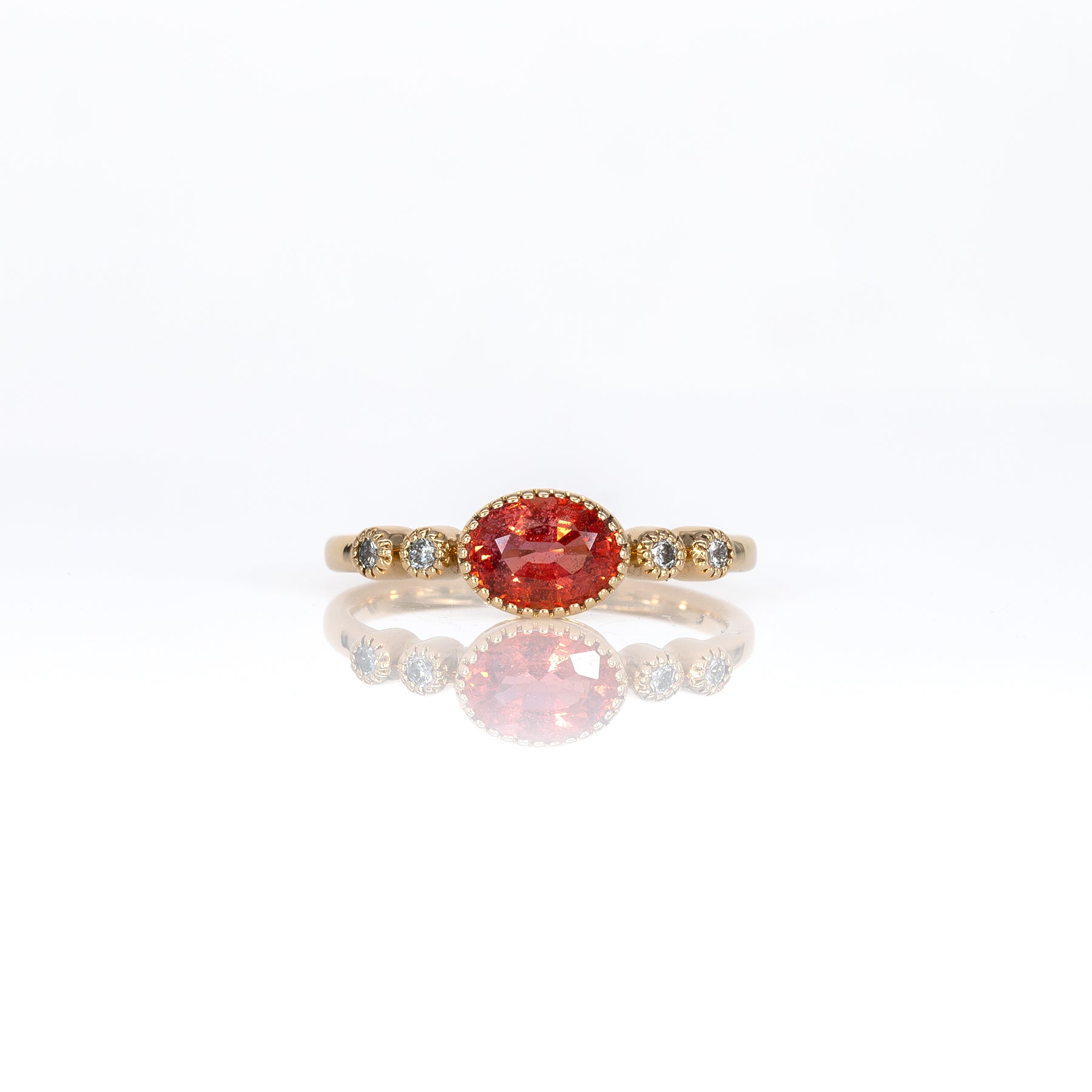 14K yellow gold padparadscha sapphire oval ring with diamond accents