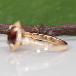 14K yellow gold red spinel ring with diamond accents