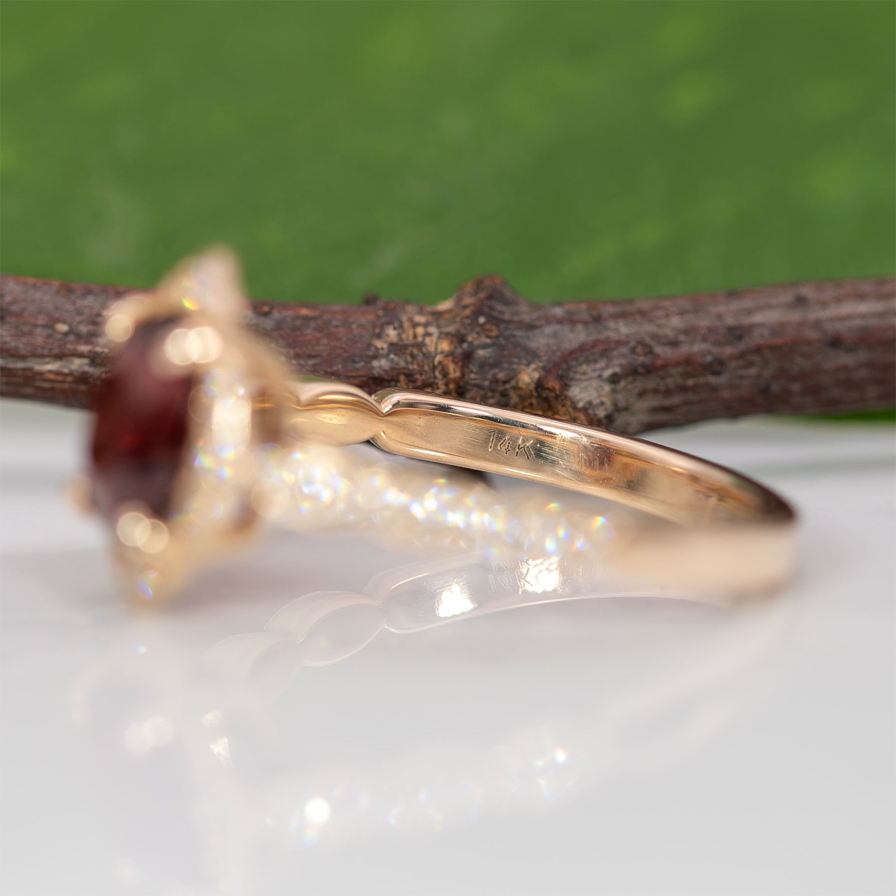 14K yellow gold red spinel ring with diamond accents