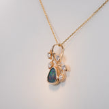 14K yellow gold boulder opal pendant