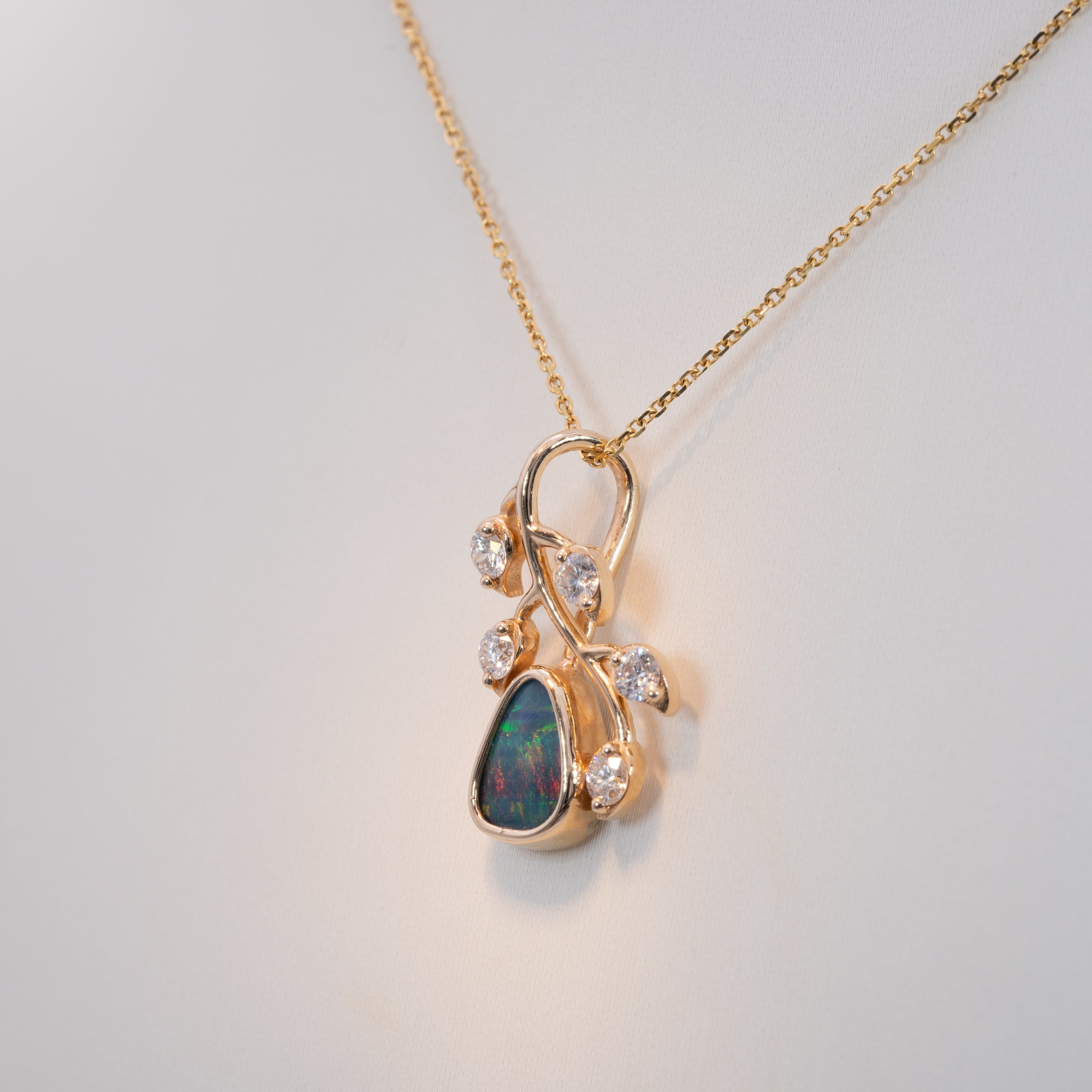 14K yellow gold boulder opal pendant