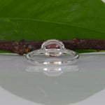 14K white gold padparadscha sapphire oval ring with diamond halo