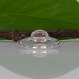 14K white gold padparadscha sapphire oval ring with diamond halo