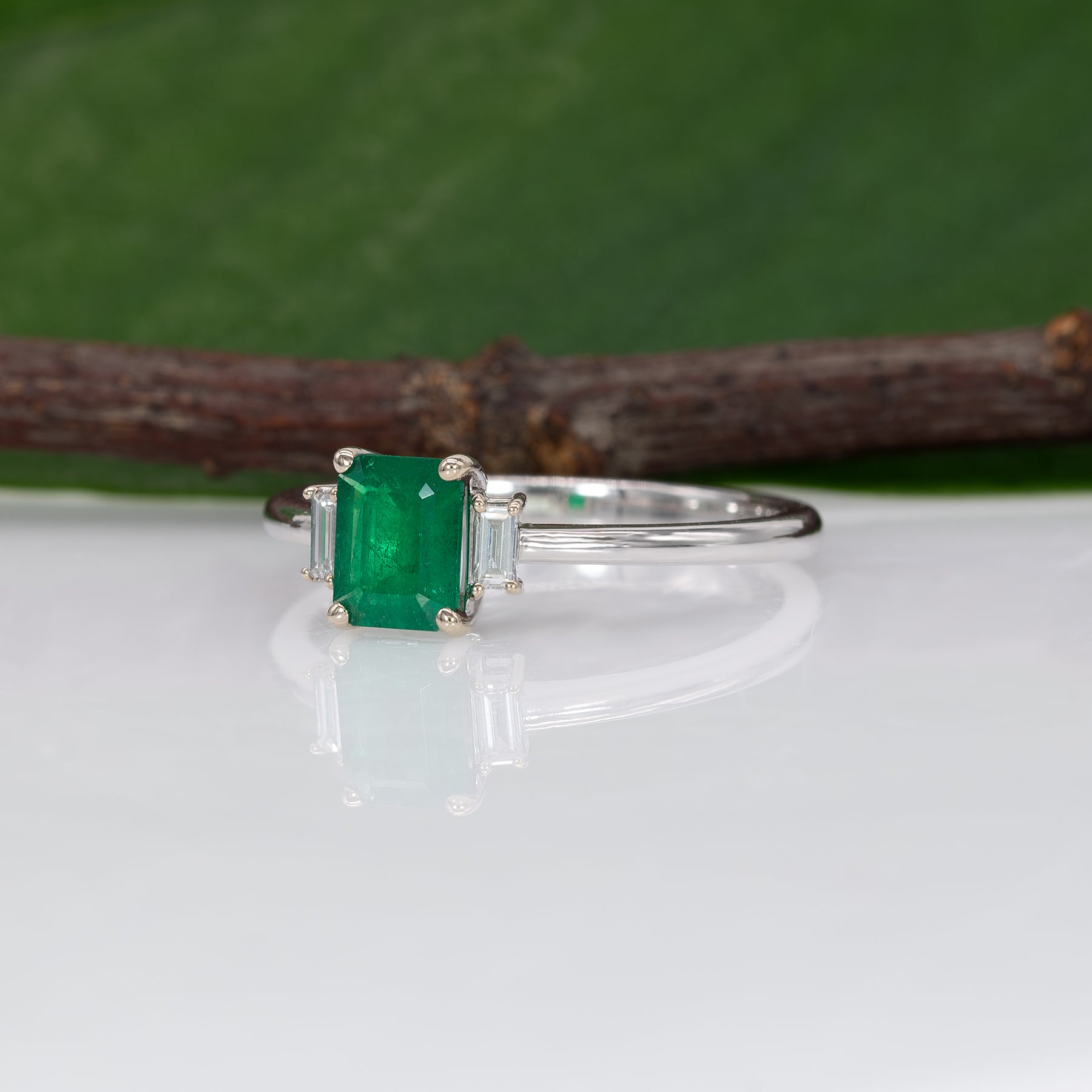 14K white gold Colombian emerald ring with diamond accents