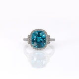 14K white gold Cambodian blue zircon cushion ring with diamond halo