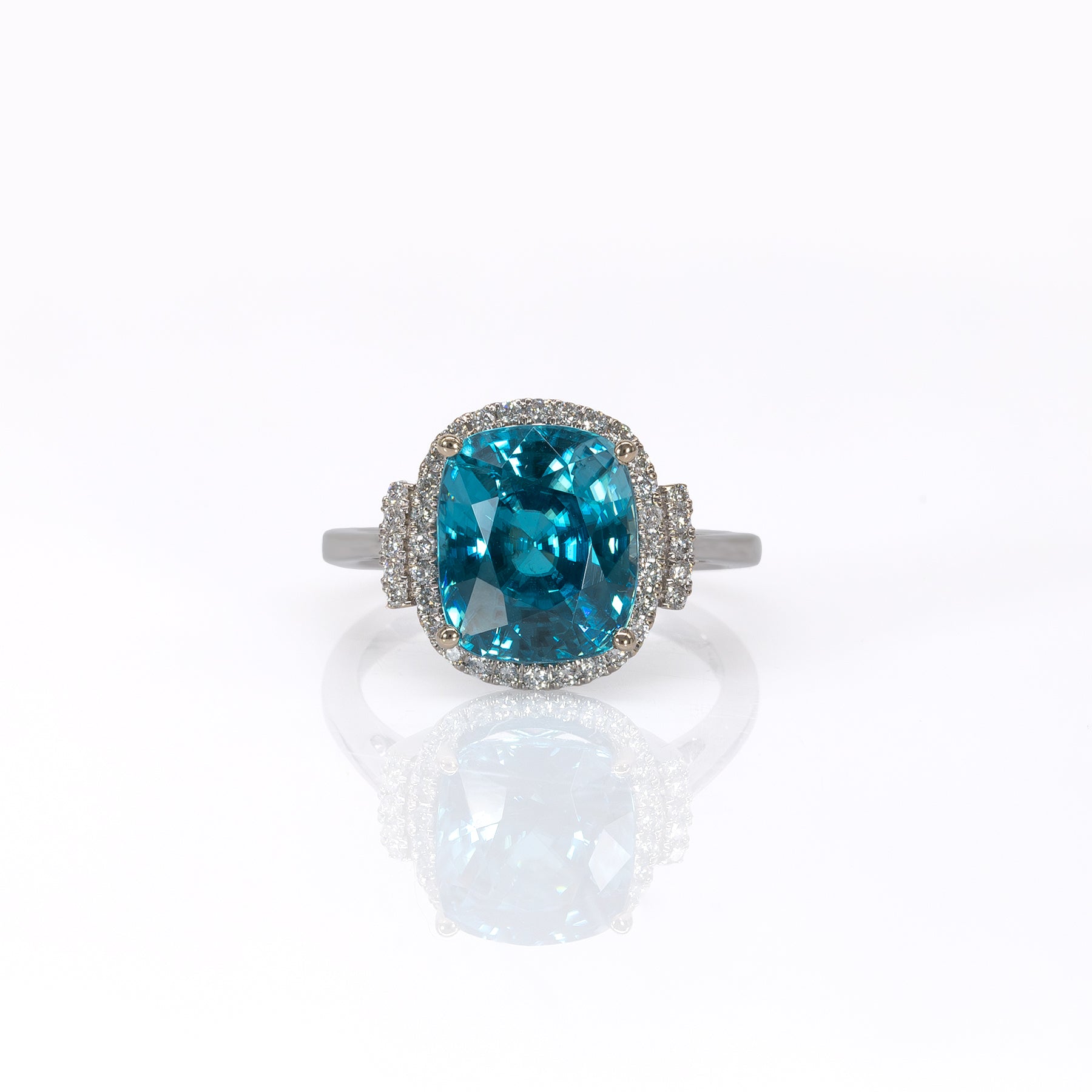 14K white gold Cambodian blue zircon cushion ring with diamond halo