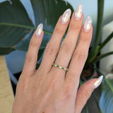 14K yellow gold Zambian emerald band ring with diamond accents
