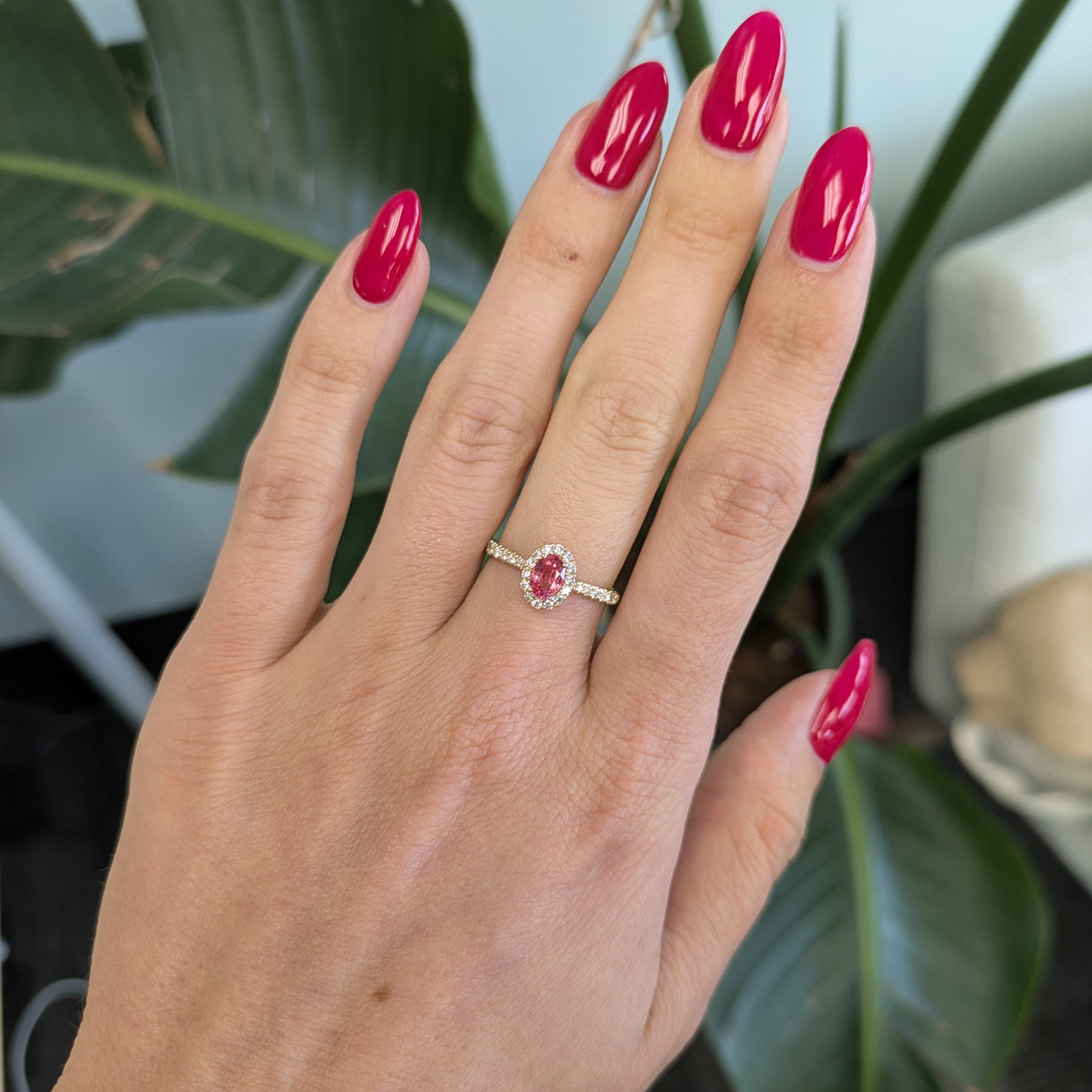 14K yellow gold padparadscha sapphire ring with diamond accents