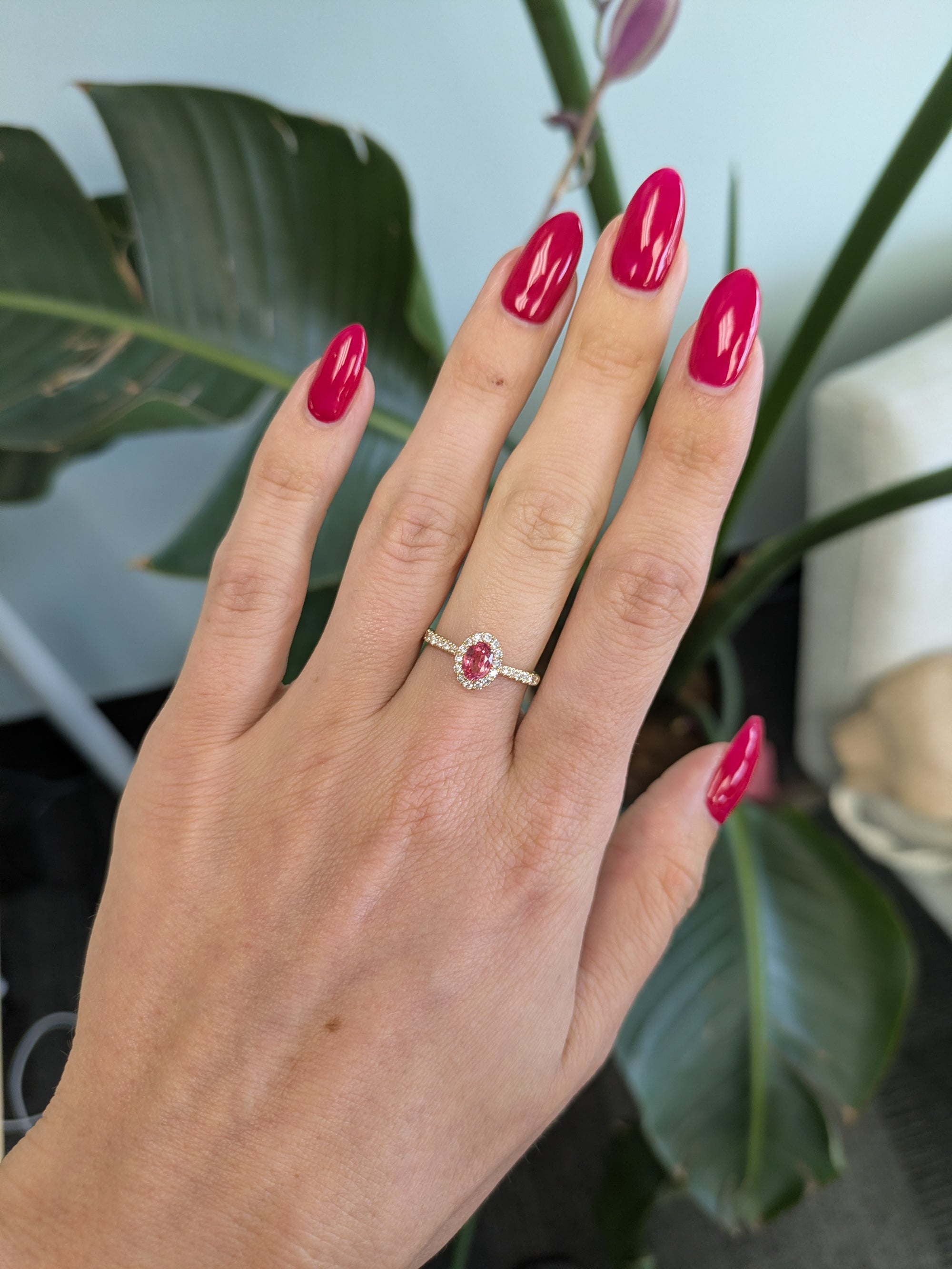 14K yellow gold padparadscha sapphire ring with diamond accents