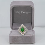 14K two-tone gold tsavorite garnet ring with diamond accents