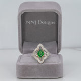 14K two-tone gold tsavorite garnet ring with diamond accents