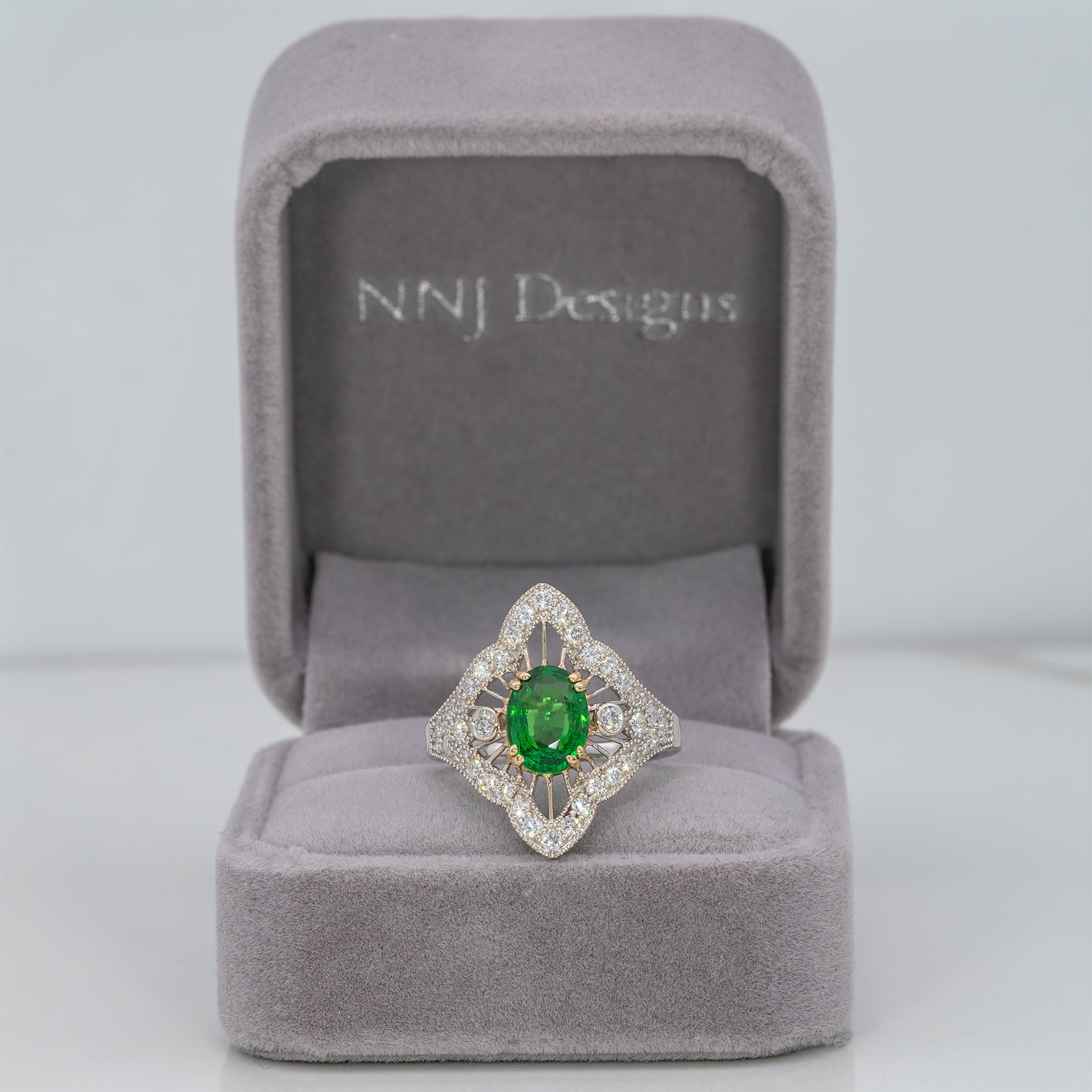 14K two-tone gold tsavorite garnet ring with diamond accents