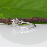 14K white gold pink sapphire pear ring with diamond halo