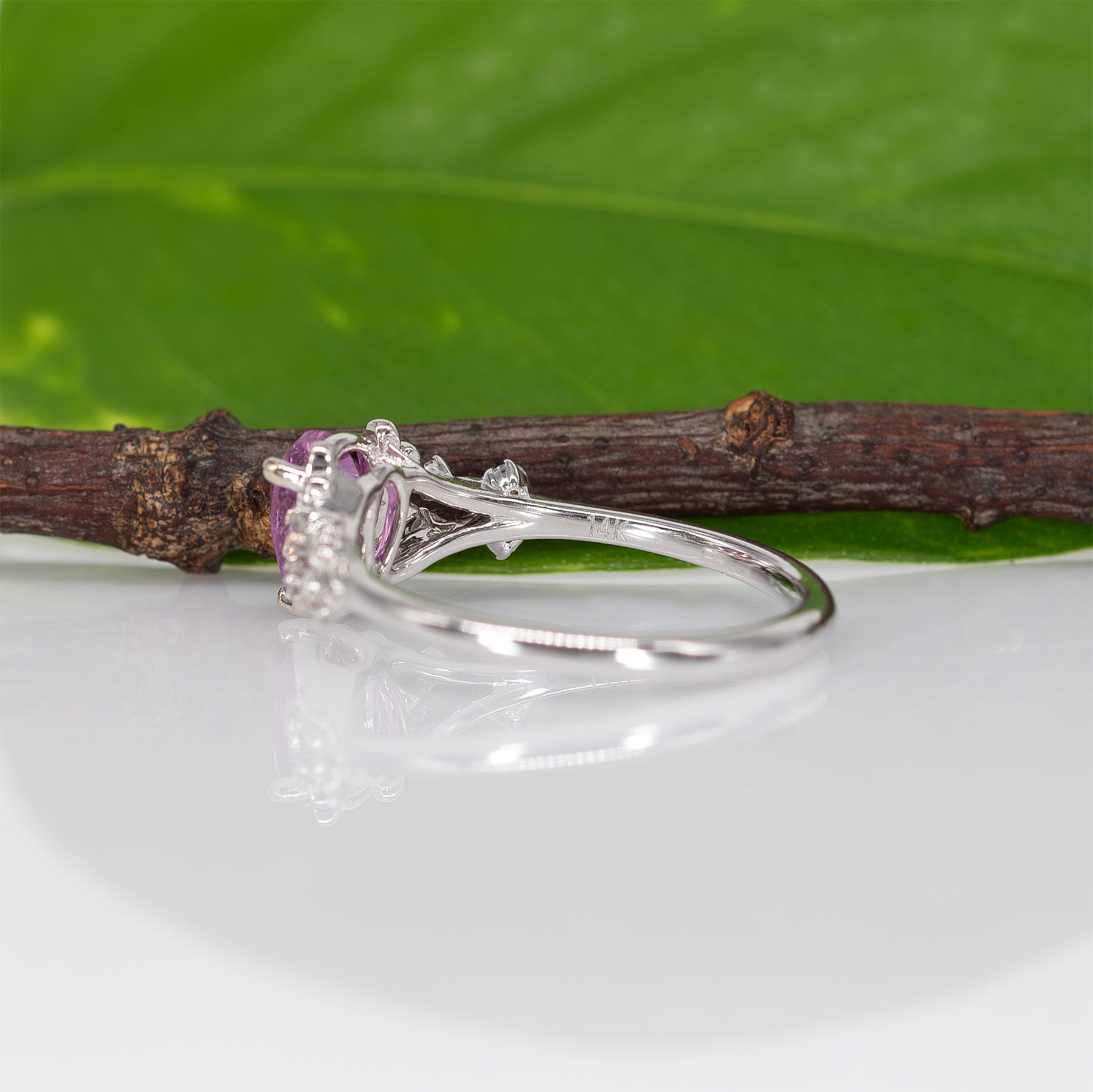 14K white gold pink sapphire pear ring with diamond halo