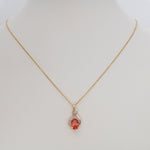 14K yellow gold padparadscha sapphire pendant