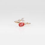 14K yellow gold padparadscha sapphire ring with diamond accents