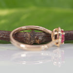 14K yellow gold padparadscha sapphire ring with diamond accents