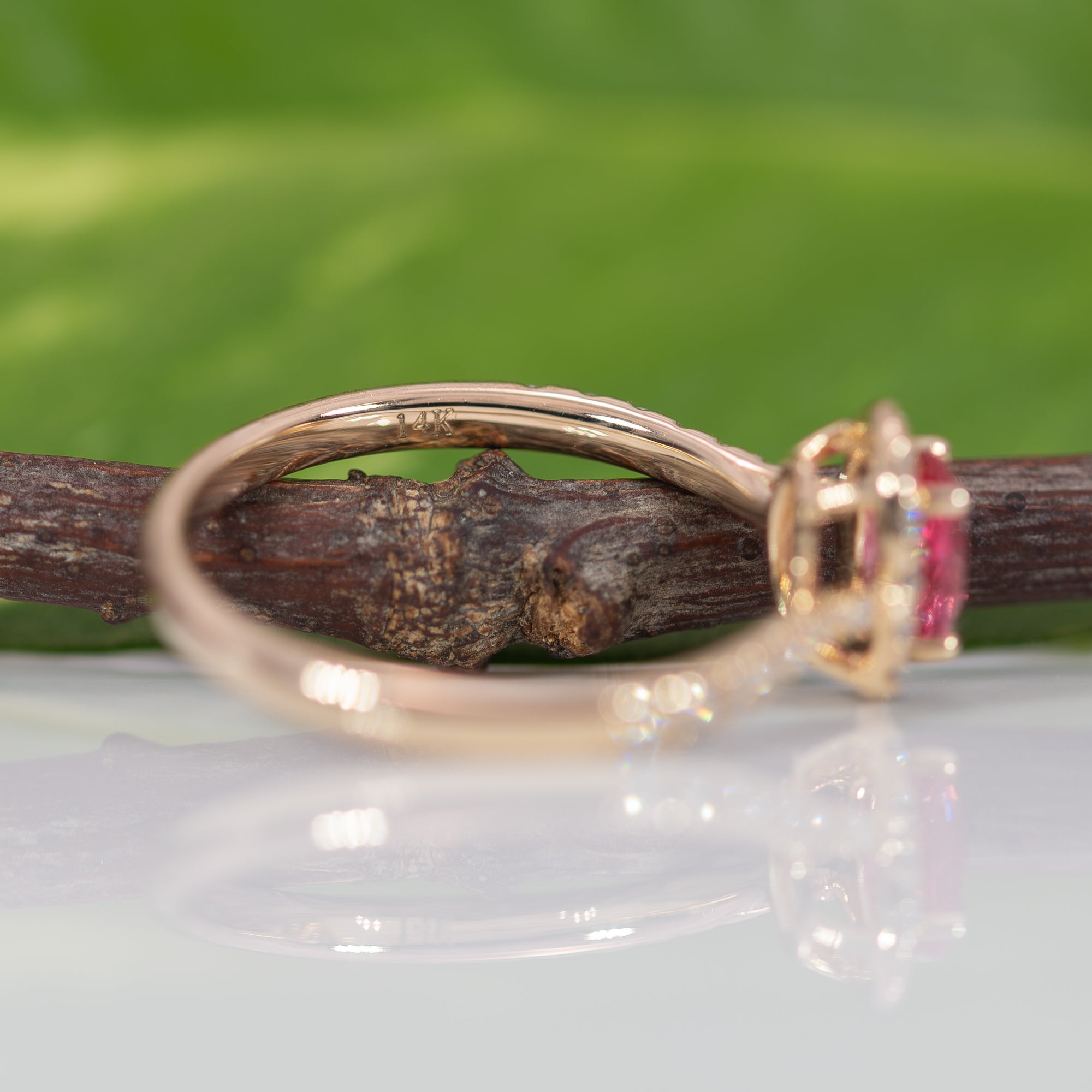 14K yellow gold padparadscha sapphire ring with diamond accents