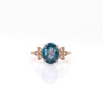 14K rose gold London blue topaz ring with diamond accents