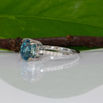 14K white gold Cambodian blue zircon cushion ring with diamond accents