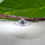 14K white gold pear alexandrite ring with diamond halo