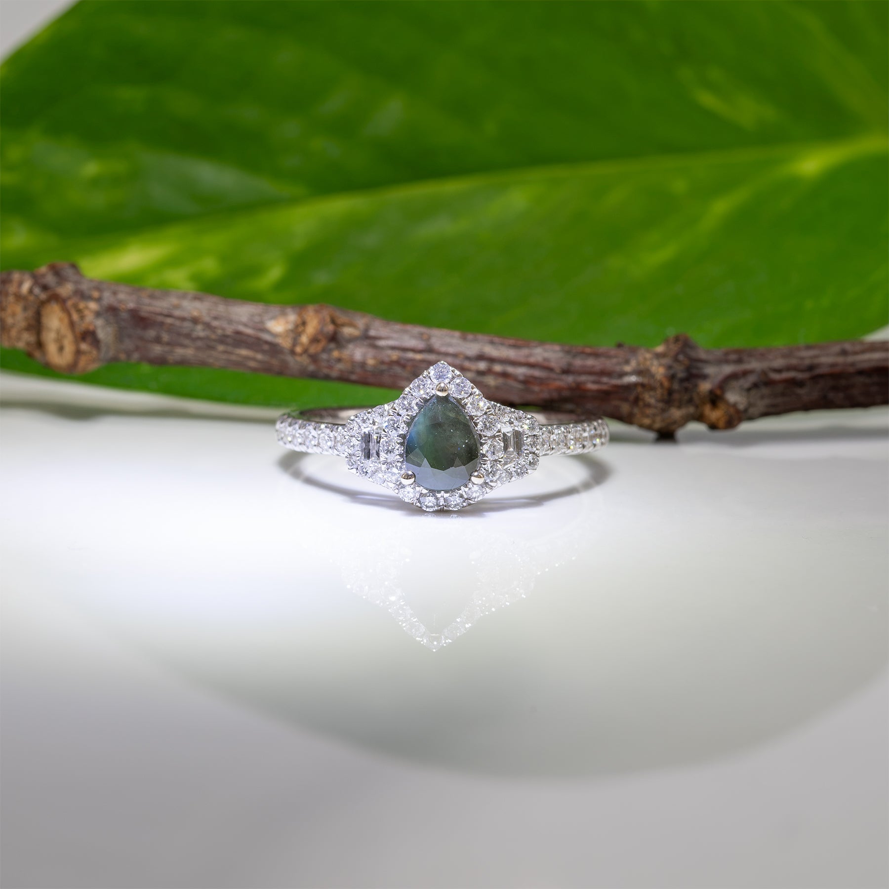 14K white gold pear alexandrite ring with diamond halo