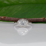 14K white gold oval lab grown diamond ring with diamond accents
