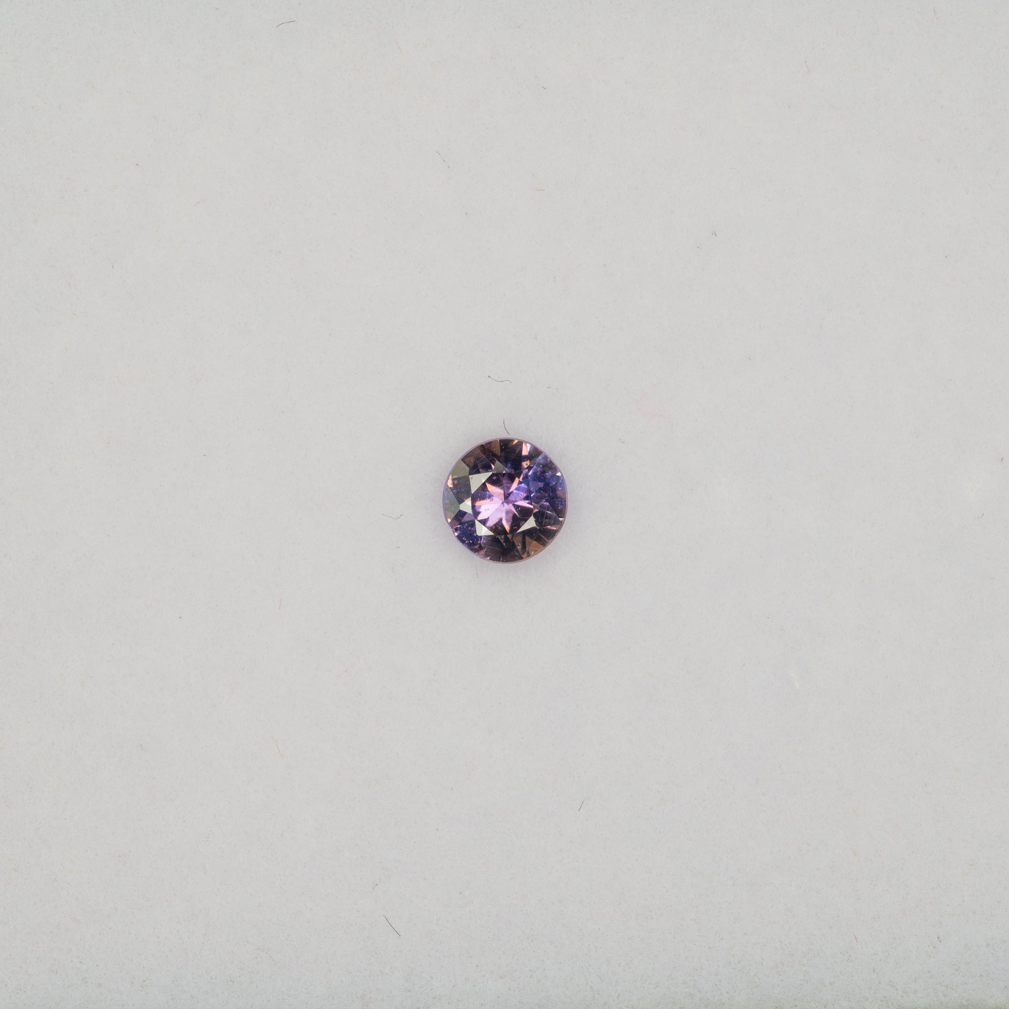 0.33 carat natural purple sapphire round 4.3mm loose gemstone – view 2