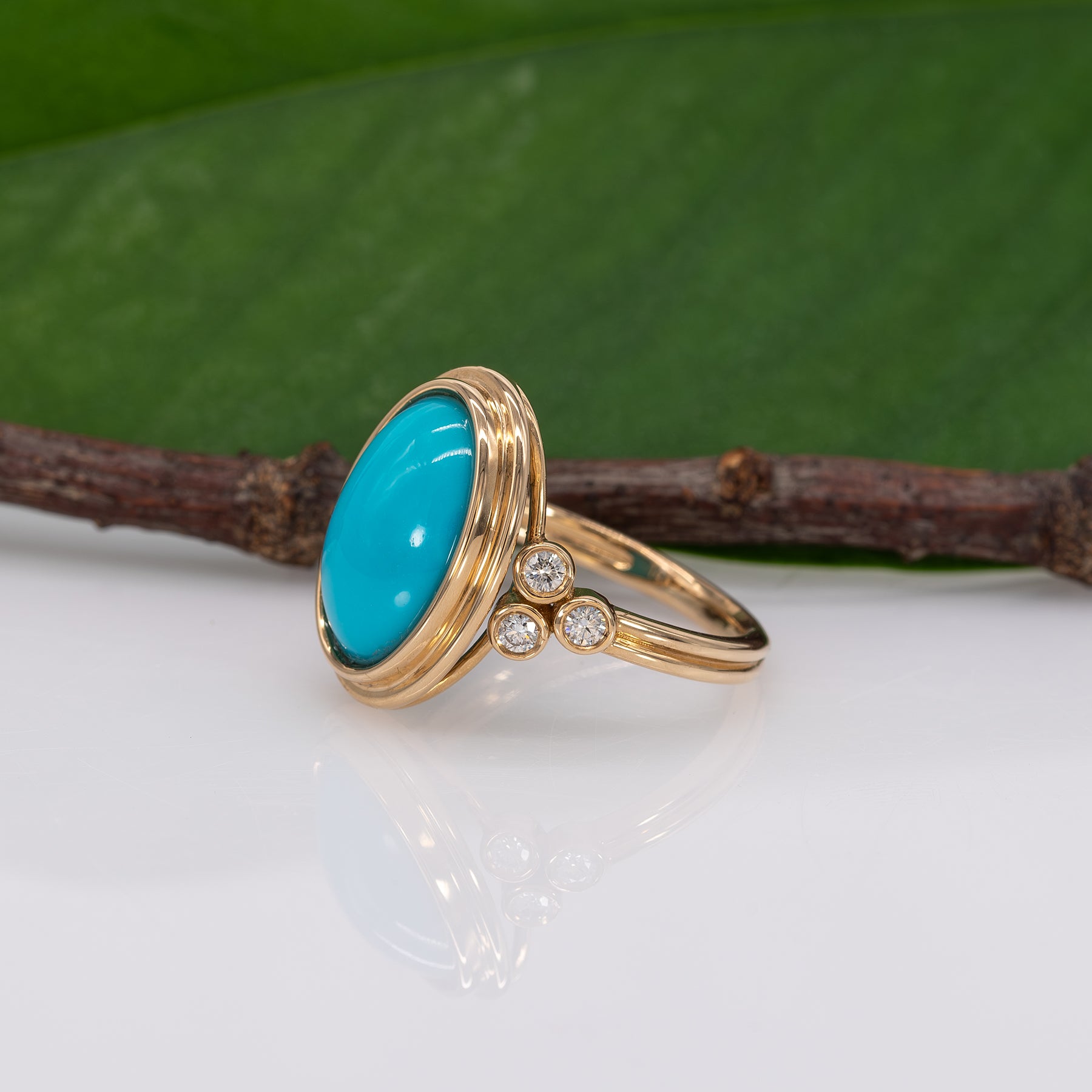 14K yellow gold turquoise cabochon ring with diamond accents