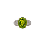 14K white gold peridot oval ring with diamond halo