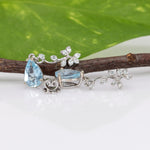14K white gold aquamarine pear earrings with lab grown diamond accents