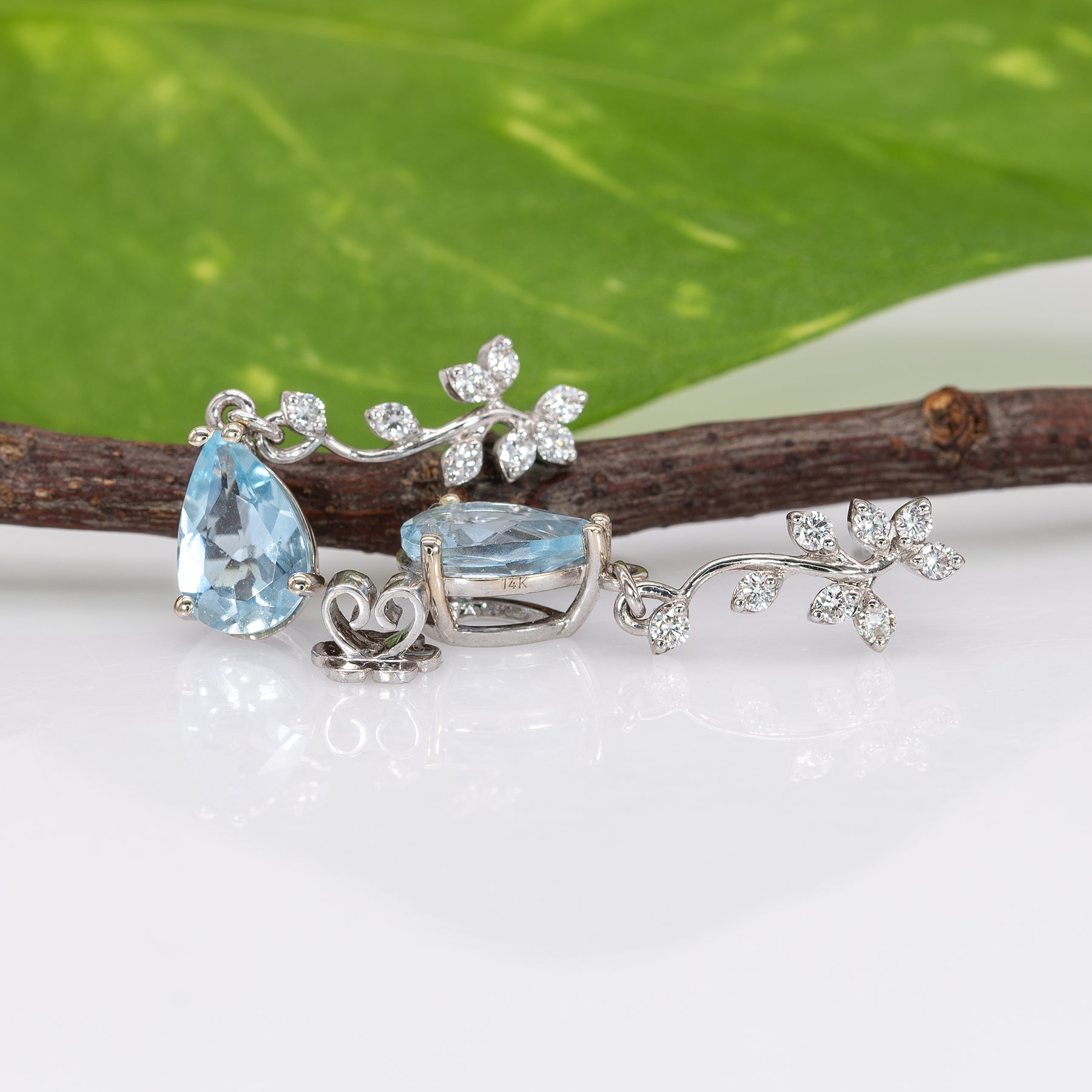 14K white gold aquamarine pear earrings with lab grown diamond accents