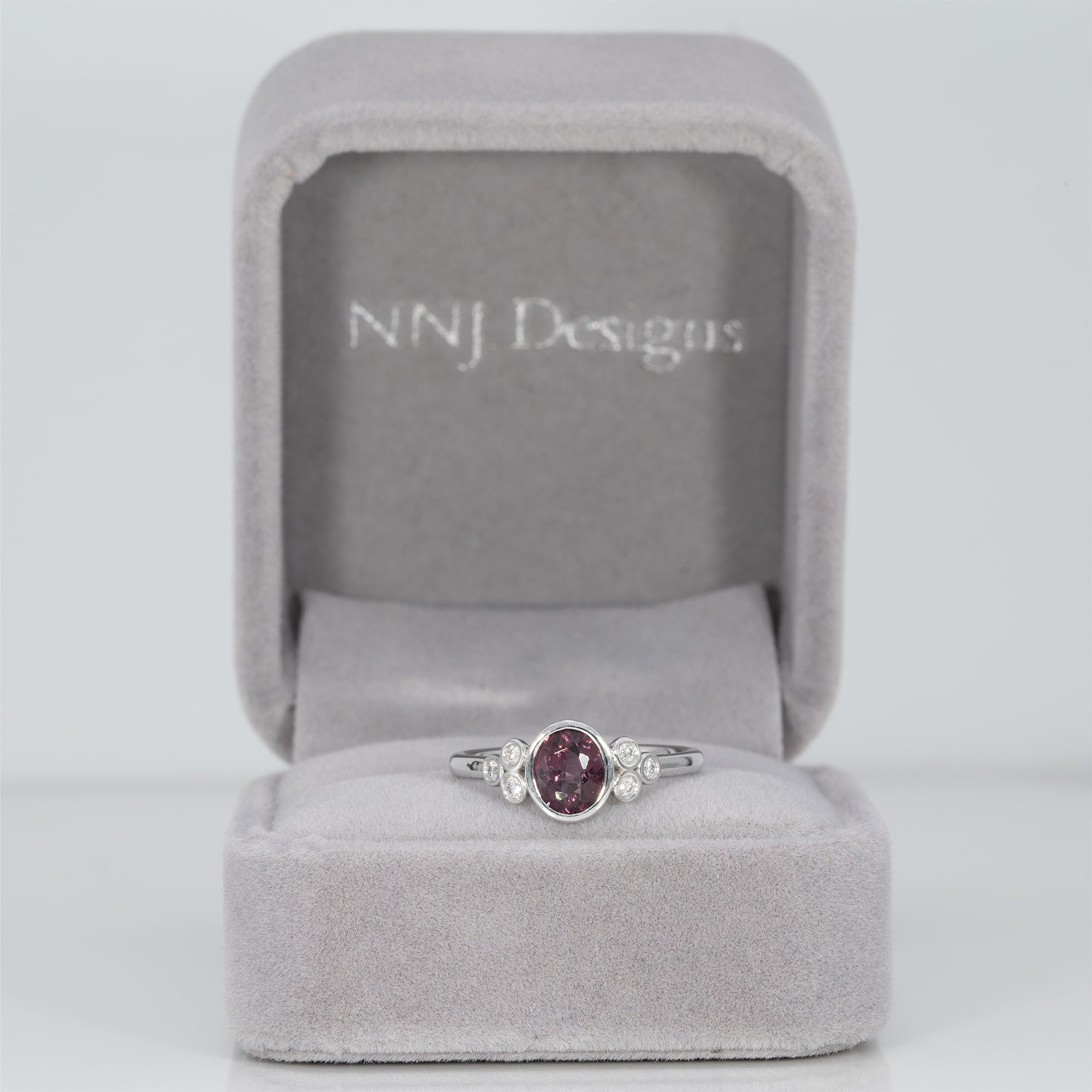 14K white gold purple spinel ring with diamond accents