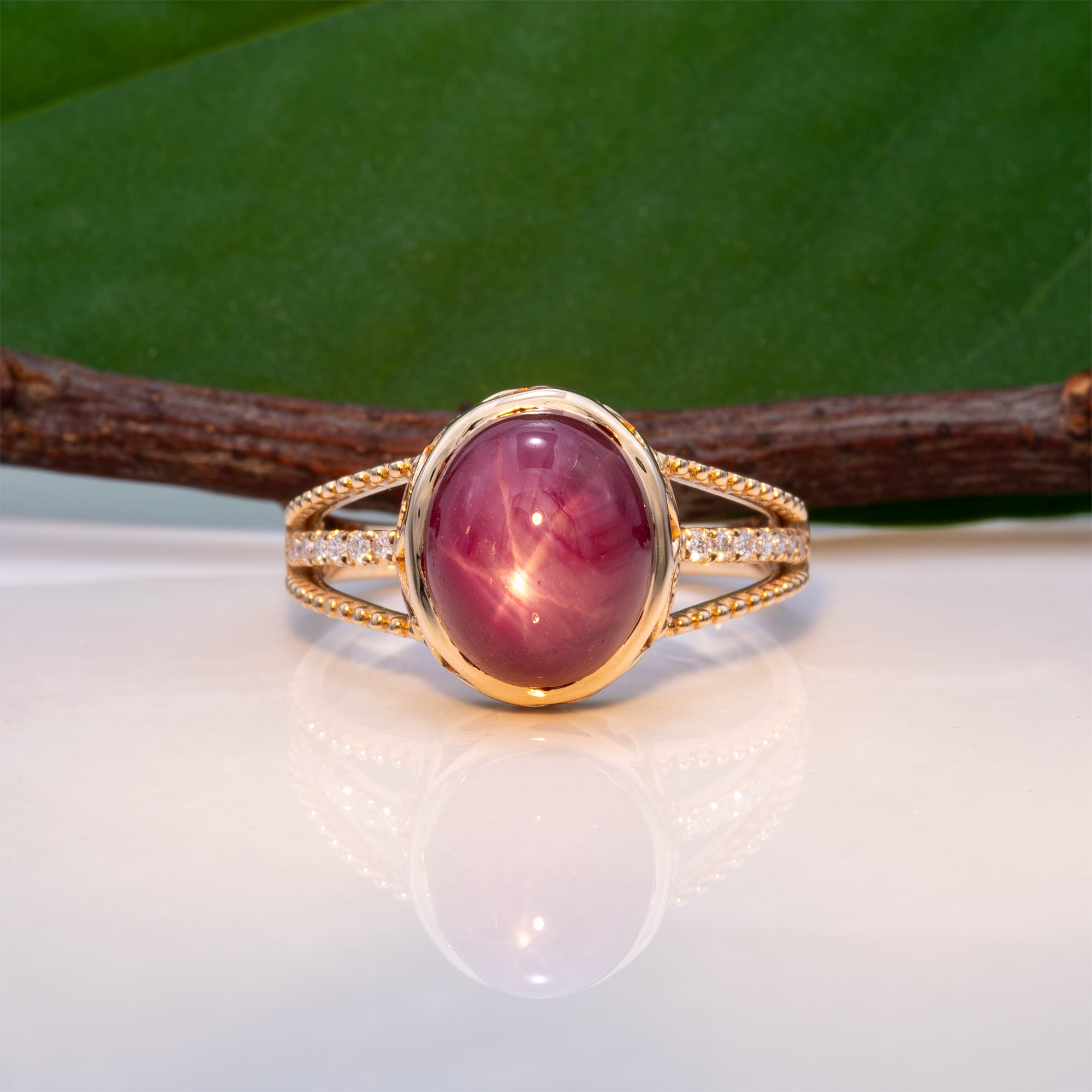 14K yellow gold star ruby cabochon ring with diamond accents