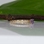 14K yellow gold purple sapphire round ring with diamond halo