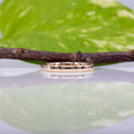 14K yellow gold diamond and emerald band ring