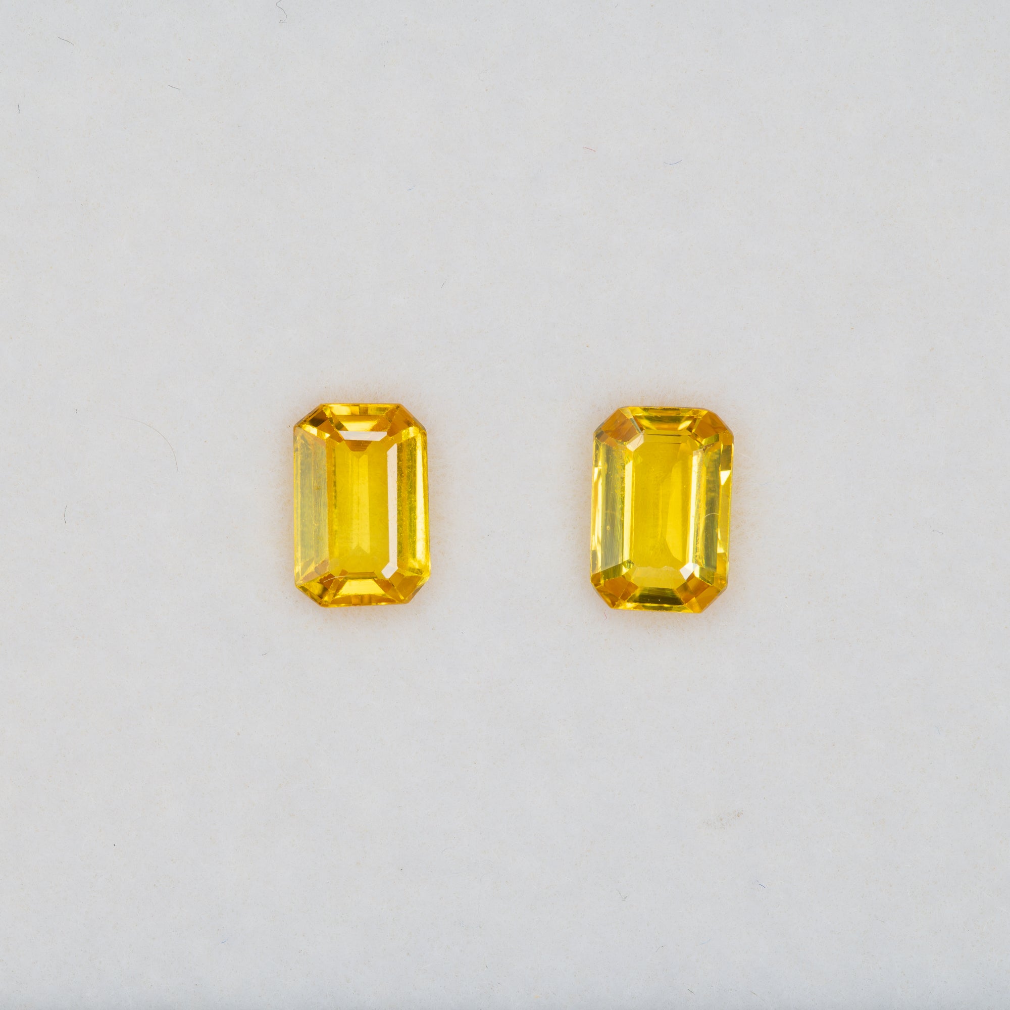0.6 carat natural yellow sapphire, emerald cut 6x4mm loose yellow gemstone