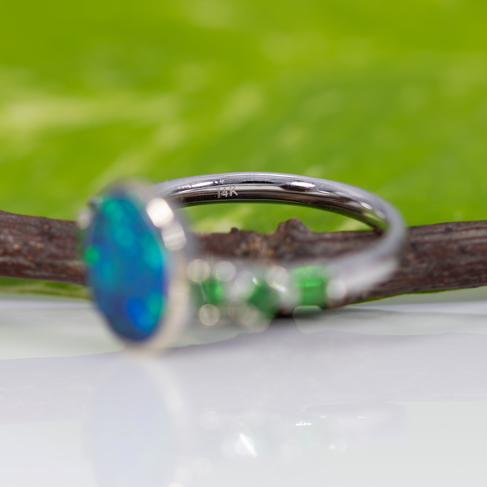 14K white gold boulder opal cabochon ring with tsavorite accents