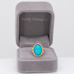 14K yellow gold turquoise cabochon ring with diamond accents