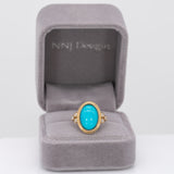 14K yellow gold turquoise cabochon ring with diamond accents