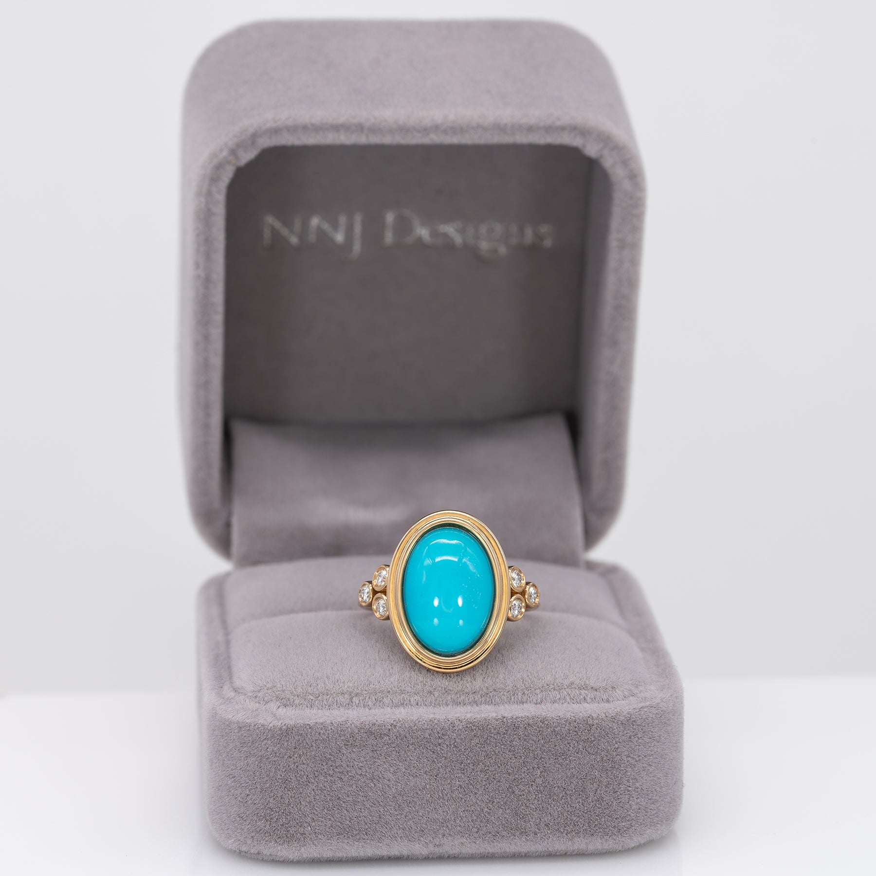 14K yellow gold turquoise cabochon ring with diamond accents