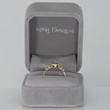 14K yellow gold padparadscha sapphire oval ring with diamond accents