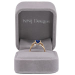 14K yellow gold cushion tanzanite ring with diamond accents