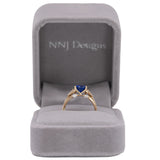 14K yellow gold cushion tanzanite ring with diamond accents