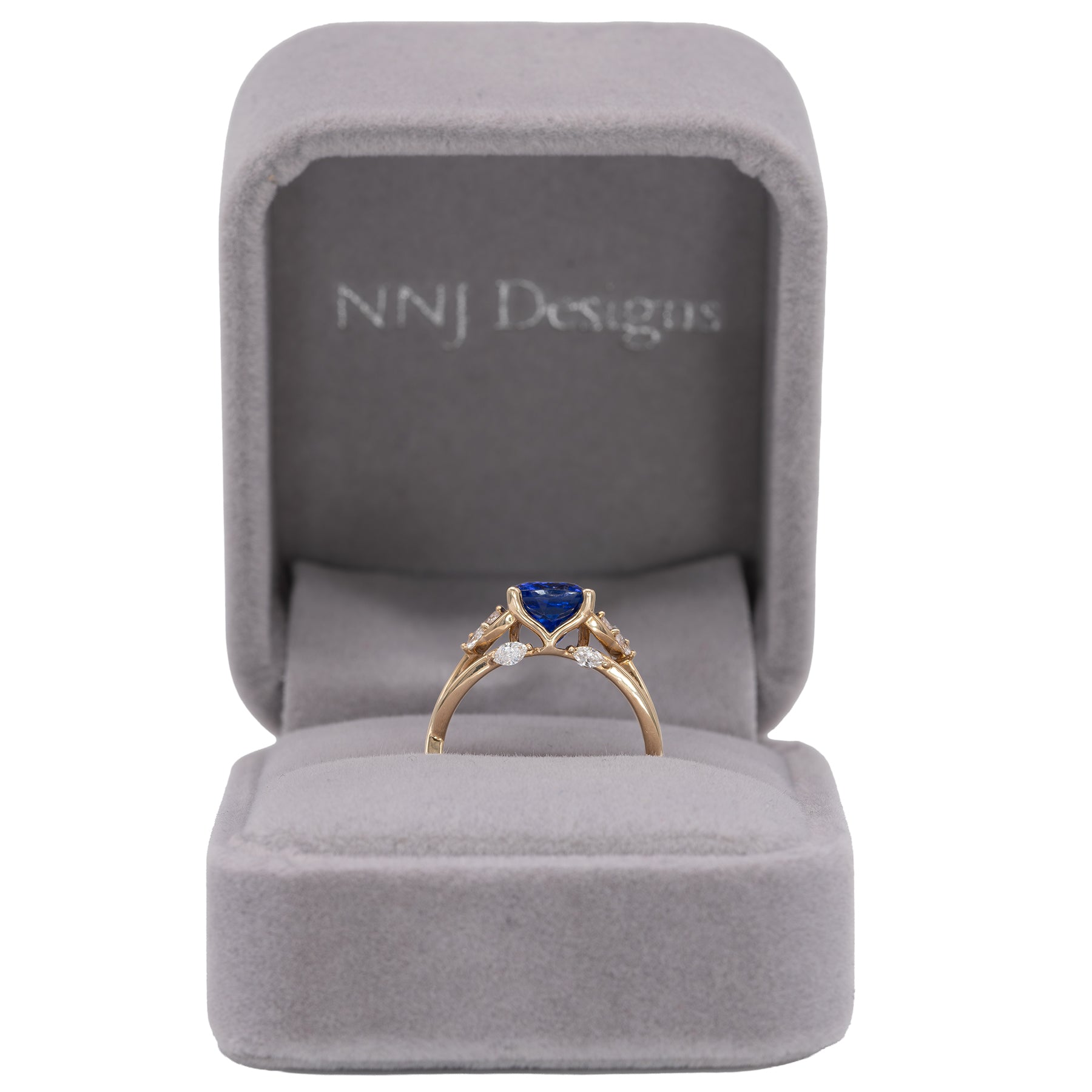14K yellow gold cushion tanzanite ring with diamond accents